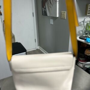 Creme and yellow Kate Spade handbag